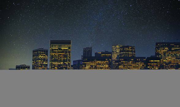 City by Night with LIghts on in Buildings and stars Overhead