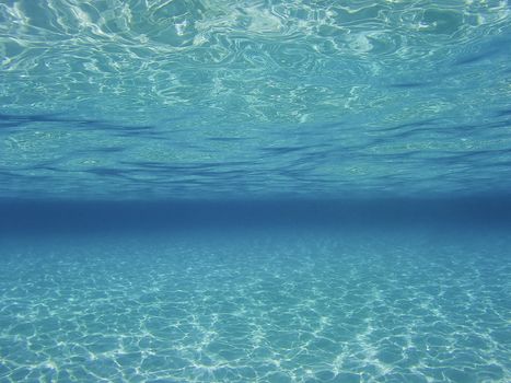 Half underwater photograph in the mediterranean sea near Malta, Comino, Blue Lagoon 2019