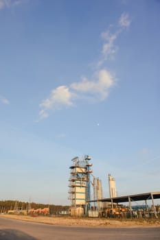Modern industrial exterior building over blue sky