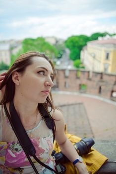 Beautiful girl during sightseeing old castle in Cracow, Wawel. Summer time