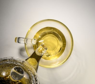 Tea in a glass Cup on a white background.