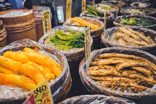 Kyoto, Japan - November 09, 2018: Various marinated vegetables at Nishiki market. Japanese preserved vegetable is a traditional dish for Japanese.