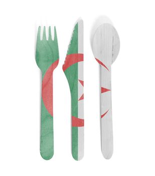 Eco friendly wooden cutlery - Plastic free concept - Isolated - Flag of Algeria