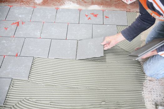 a tiler worker at work