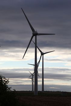 wind turbine on sunset background