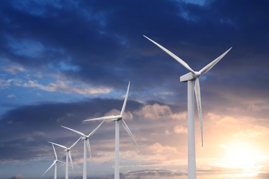wind turbine on sunset background