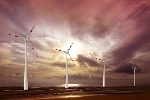wind turbine on sunset background