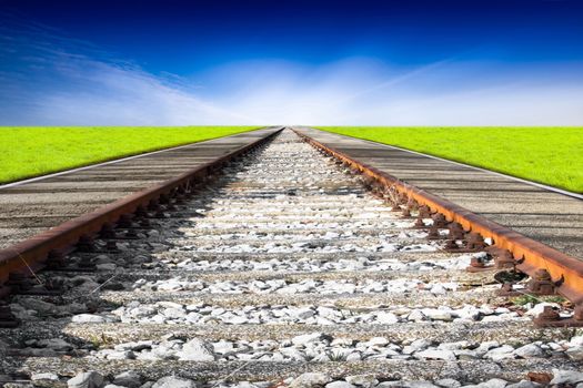 Train rails in country landscape