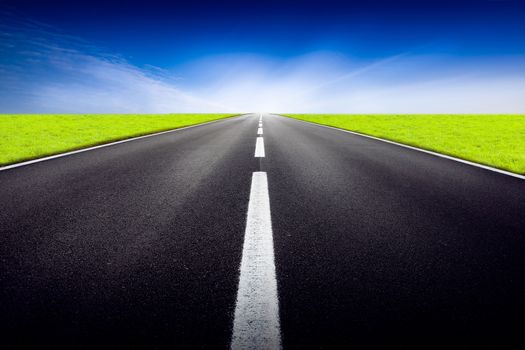a fantastic desert road with blue sky