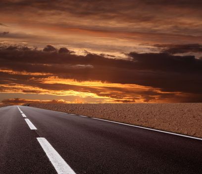 a fantastic desert road with clouds