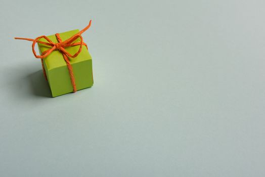 christmas presents nicely decorated with bows and feathers. view from above