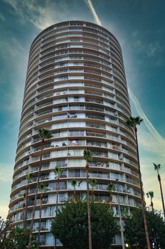 Round Condo Tower in Tropical Sky