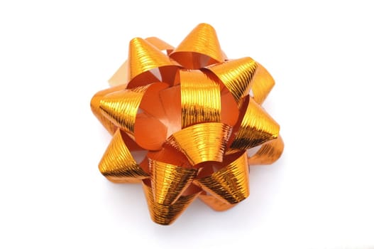 Orange lush bow isolated over white background 