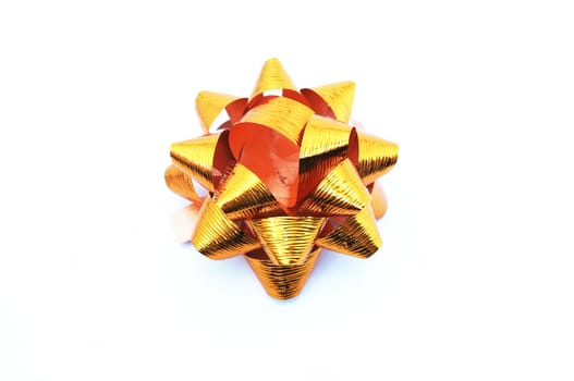 Orange lush bow isolated over white background 