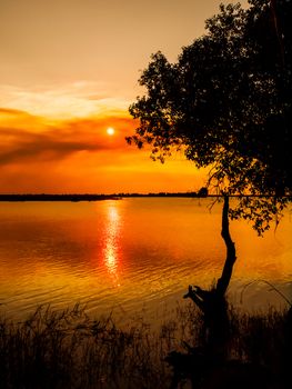 Romantic sunset at african river. Evening in Africa.