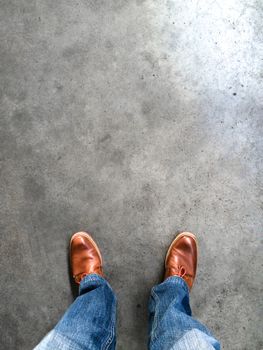 standing on an asphalt floor