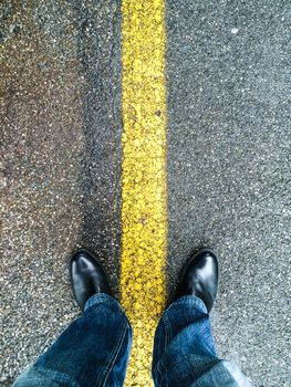 standing on an asphalt floor