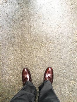 standing on an asphalt floor