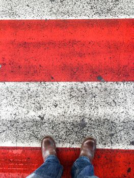 standing on an asphalt floor
