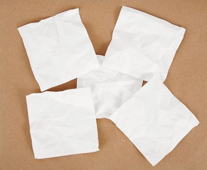 White sheet on cardboard background