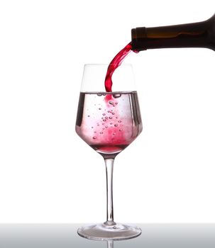glass of sparkling wine on white background