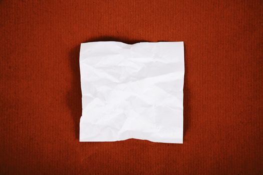 White sheet on cardboard background