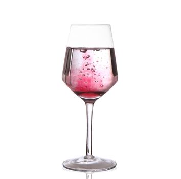 glass of sparkling wine on white background