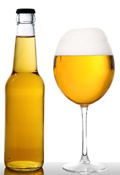 bottle and glass of beer on white background