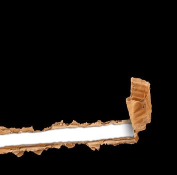 torn cardboard on black background