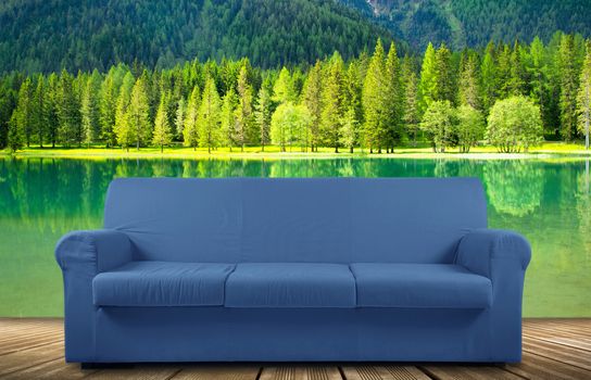 Blue sofa on nature background
