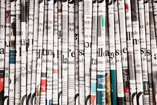 Newspapers folded and crushed to form a background
