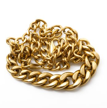 precious gold chain on white background