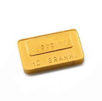 little gold ingot on white background