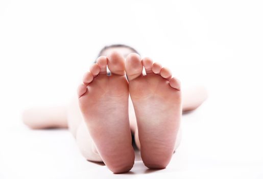 isolated caucasian feet on white background