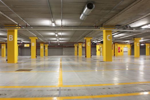 an empty big underground parking
