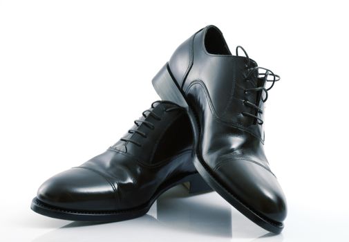elegant male shoes on white background