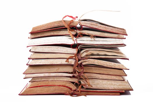 Stack of books on white background