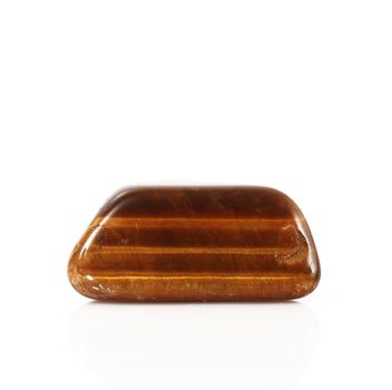 isolated tiger eye stone on white background