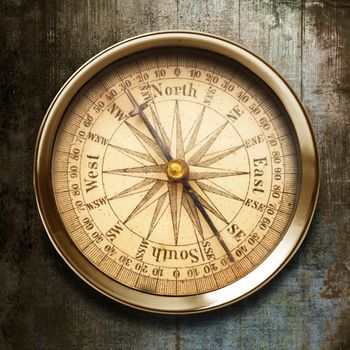 old compass on vintage background