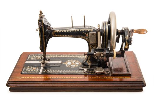 old sewing machine on white background