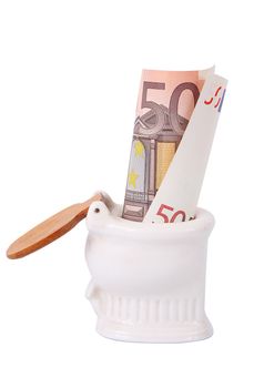 Money in toilet on white background