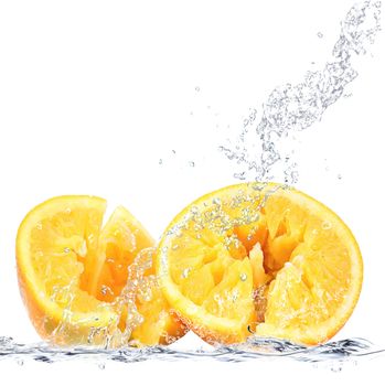 fresh orange falling in water
