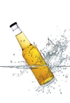 yellow glass bottle falling in water