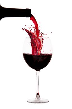 a glass with ice and wine splash