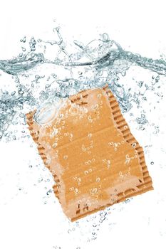 little piece of cartboard falling in water