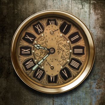 a vintage watch on a wooden background