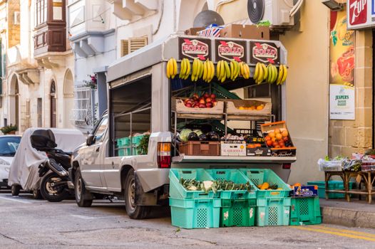 La Vallette,Malte,Europe-30/11/2019.Small truck filled with vegetables and fresh fruits for sale in the streets of Cefalu in Sicily