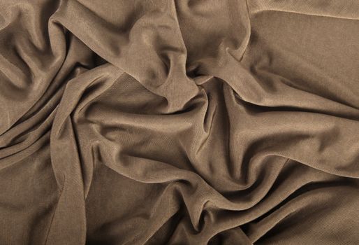 a brown curled cloth background