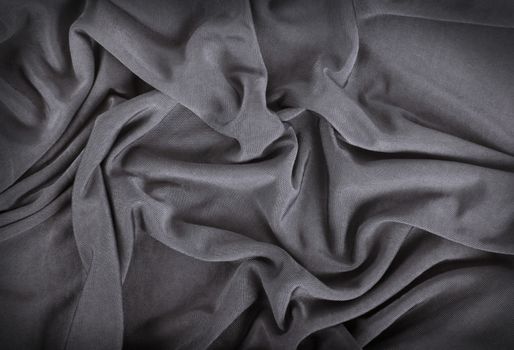 a grey curled cloth background