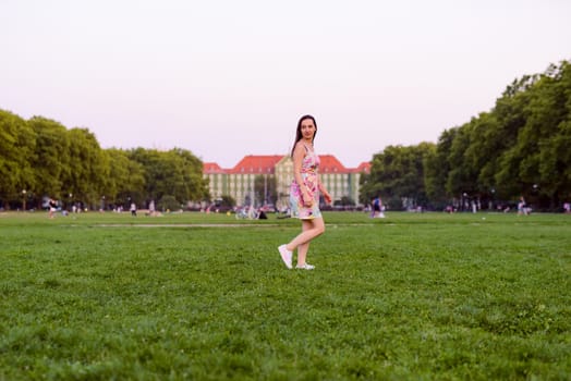 Autumn attractive woman portrait smiling outdoors at the park. Authentic and natural photographs